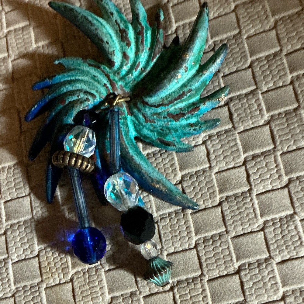 Vintage abstract swirl brooch made of metal Turquoise and blue colors.